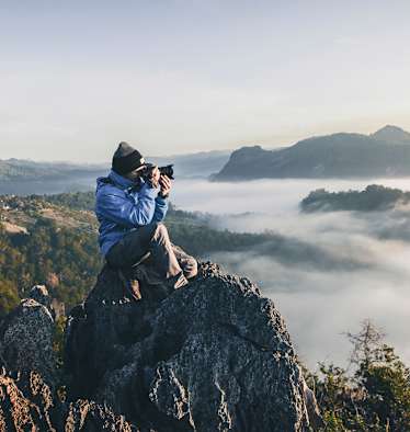 Fotograf auf Berg