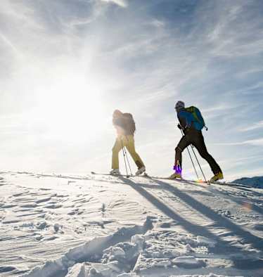 Skitourengeher auf Pistenskitour