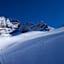 Links der Fußstein, im Einschnitt die Alpeiner Scharte als Ziel