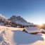 Wintersonne auf den Gampenwiesen mit Blick auf die Geislerspitzen