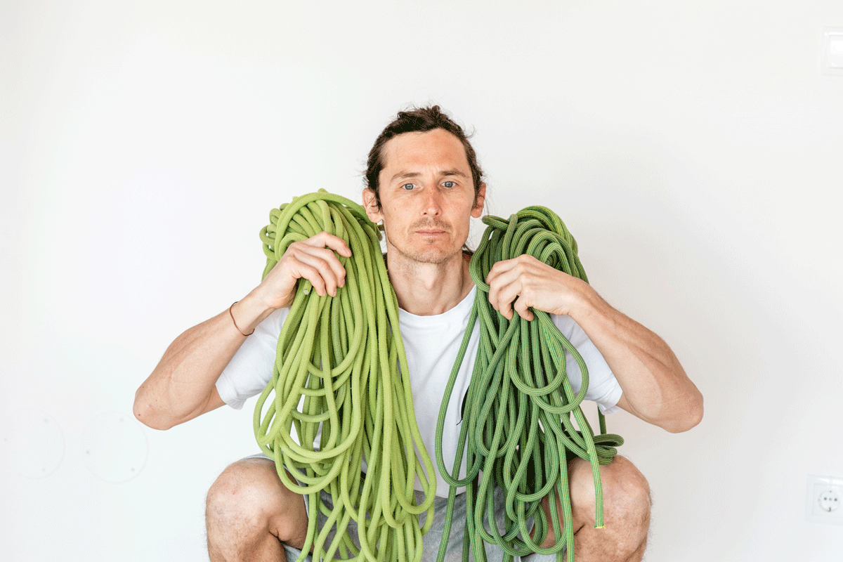 Tiefe Squats plus Schulterdrücken mit Kletterseilen