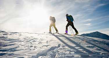 Skitourengeher auf Pistenskitour