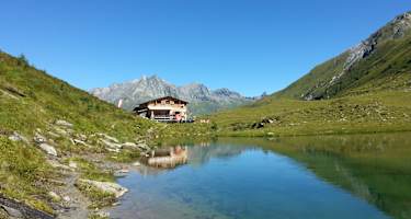 Die Bergerseehütte liegt am Rande des idyllischen Berger Sees im Zopatnitzenta.
