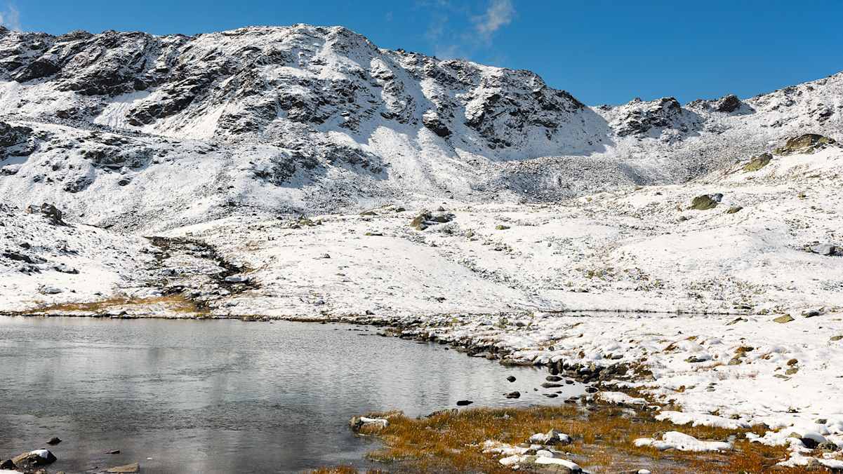 Die Macun-Seenplatte auf über 2600 m Höhe – ein unberührtes Hochplateau im Biosphärenreservat Engiadina Val Müstair.