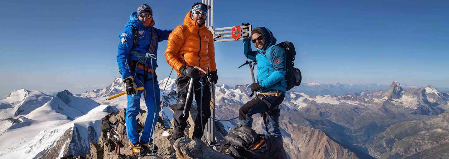 Glückliche Gesichter am Gipfel des Doms