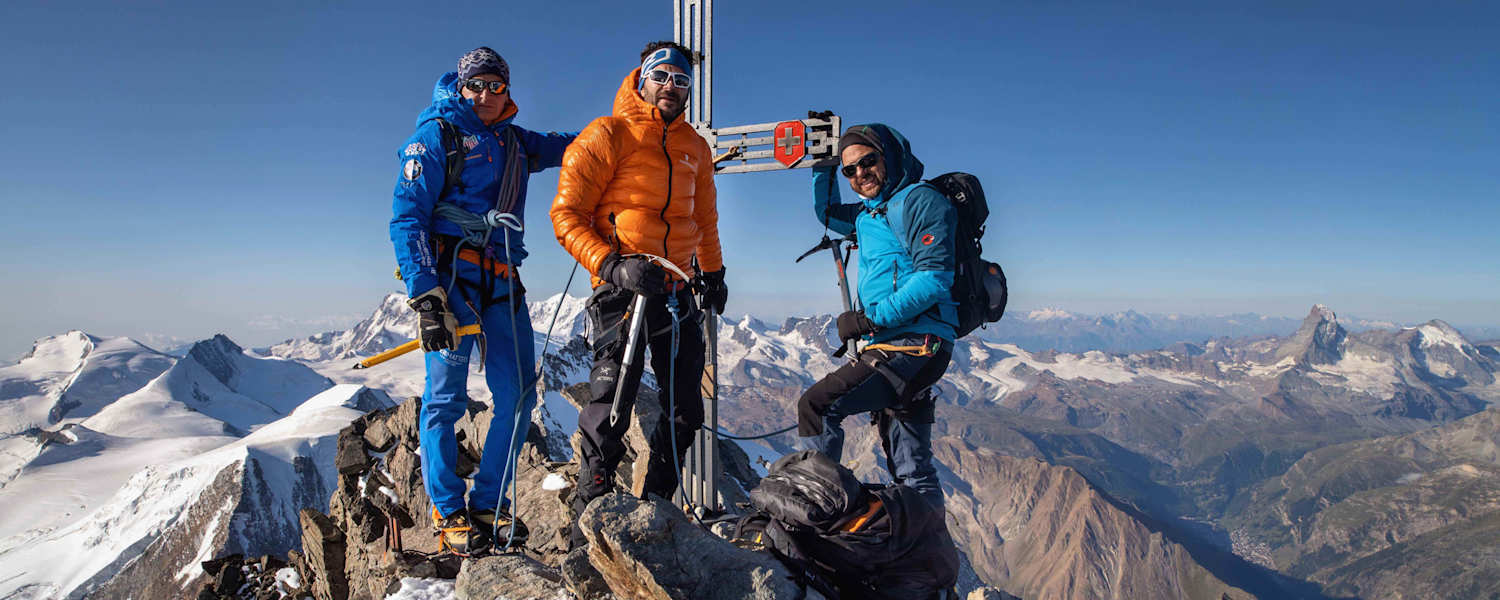 Glückliche Gesichter am Gipfel des Doms