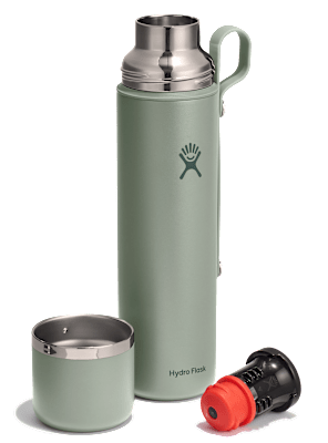 Grüne Hydro Flask Hot Flask & Cup mit passendem Becher und abnehmbarem Verschlussaufsatz, perfekt für unterwegs.