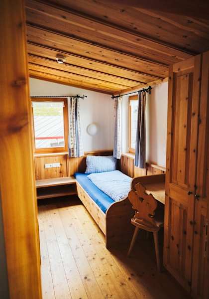 Blick in eines der gemütlichen Schlafzimmer