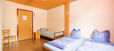 Eines der Zimmer im Berghaus Hintisberg