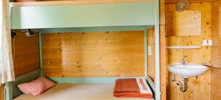 Eines der Zimmer auf der Kreuzeckhütte