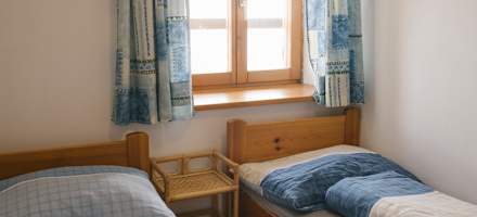 Eines der Zimmer auf der Wolfsberger Hütte