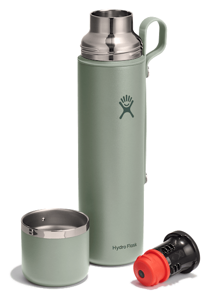 Grüne Hydro Flask Hot Flask & Cup mit passendem Becher und abnehmbarem Verschlussaufsatz, perfekt für unterwegs.