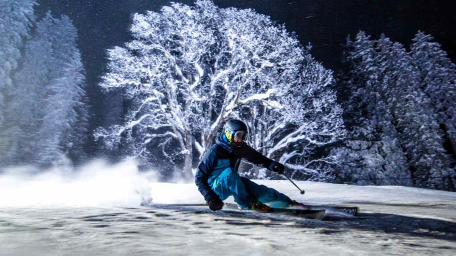 Nachtskifahren auf der beleuchteten Piste Mägisalp-Reuti.