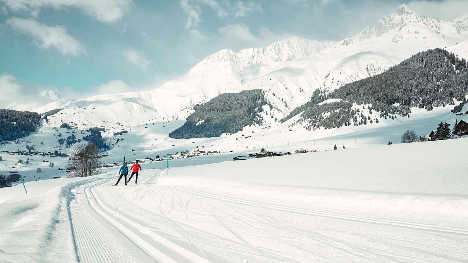 Durch die verschneite Winterlandschaft in Sedrun zu gleiten, löst Glücksgefühle aus.