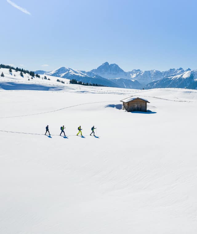 Die weiten verschneiten Almflächen am Astjoch