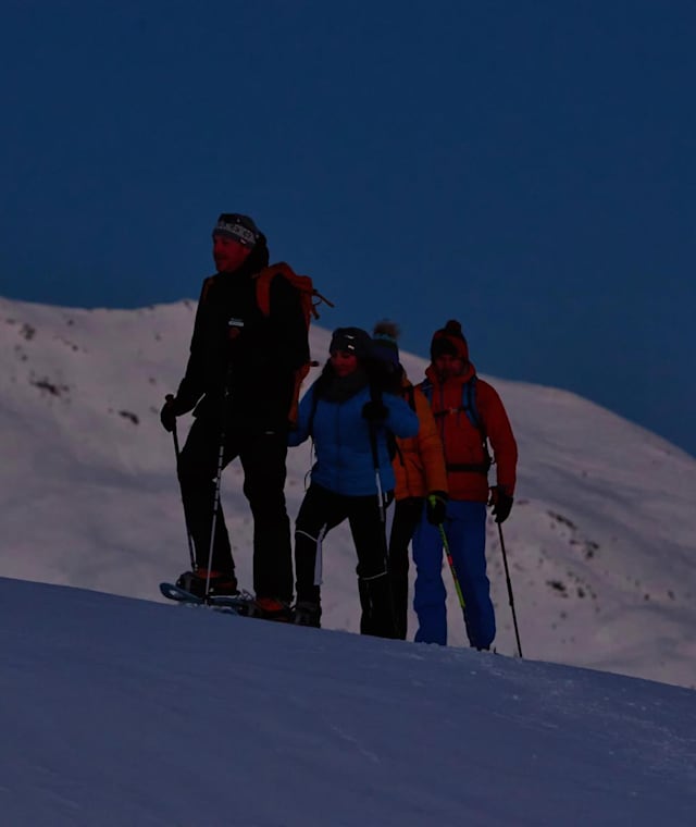 Schneewanderung bei Vollmond in Kals am Großglockner.